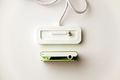 Apple iPod Shuffle second generation green top view and dock connector top view.jpg