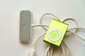 Top view of Apple iPod Shuffle Second Generation Green and bottom view of dock connector.jpg
