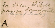 A rectangular calling card printed with "Marquess of Queensberry" in copperplate script. Hand-written across the top of the card are the words "For Oscar Wilde, posing somdomite".