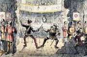 A view from the back of a stage. Two unkempt actors enact a swordfight for the audience. Men dressed as soldiers lounge and drink behind the props.